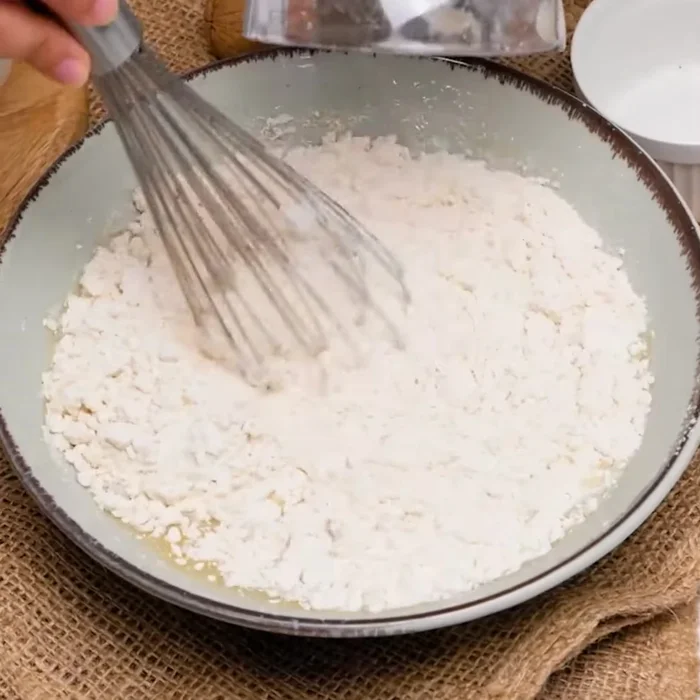 Bien mélanger jusqu'à obtenir une pâte homogène. (Mélange parfait)