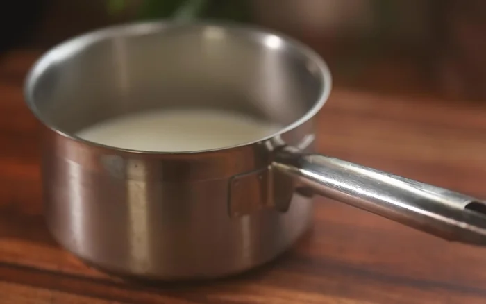 Ajouter la sauce Mornay au chou-fleur.