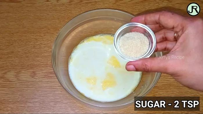 Ajouter les morceaux de mangue sur les crêpes.