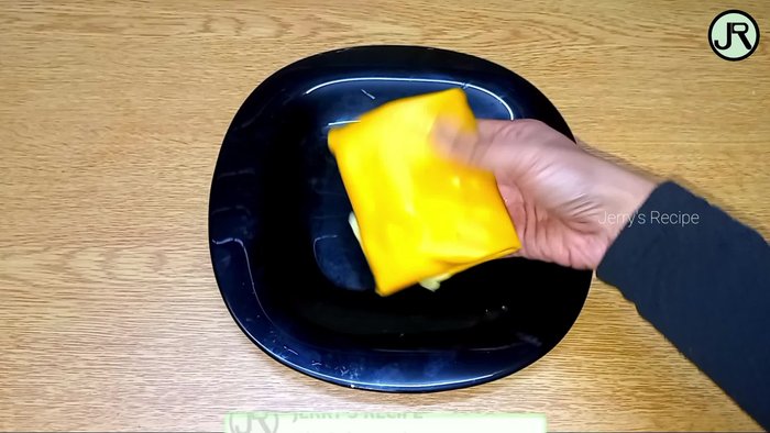 Préparation de la pâte à crêpes (recette non fournie dans la transcription).
